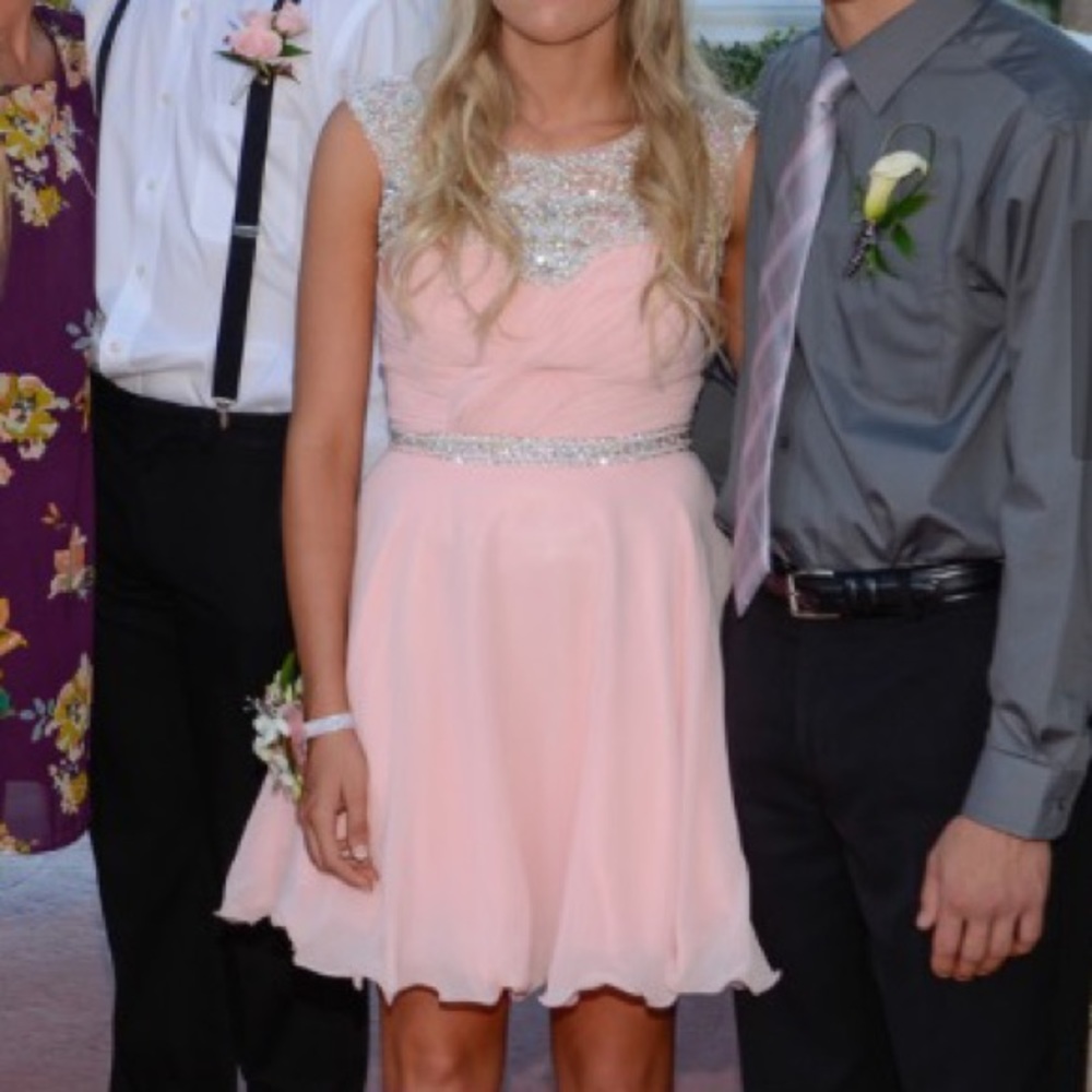 Gorgeous dress with lots of detail!